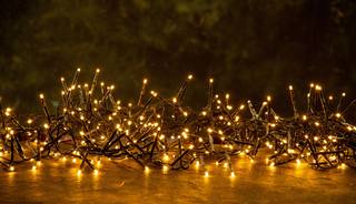 christmas-texture-yellow-lights-festive-dark-background
