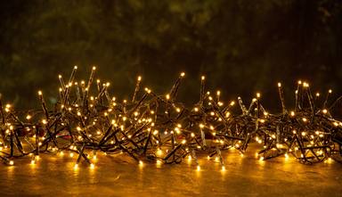 christmas-texture-yellow-lights-festive-dark-background