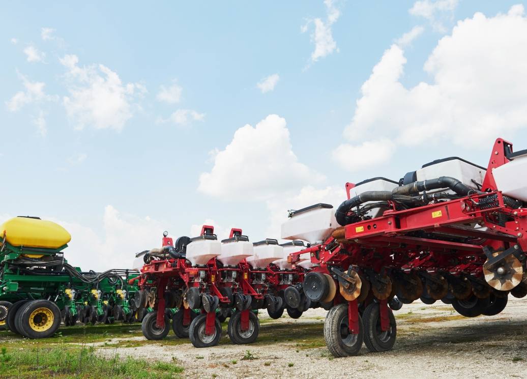close-up-seeder-attached-tractor-field
