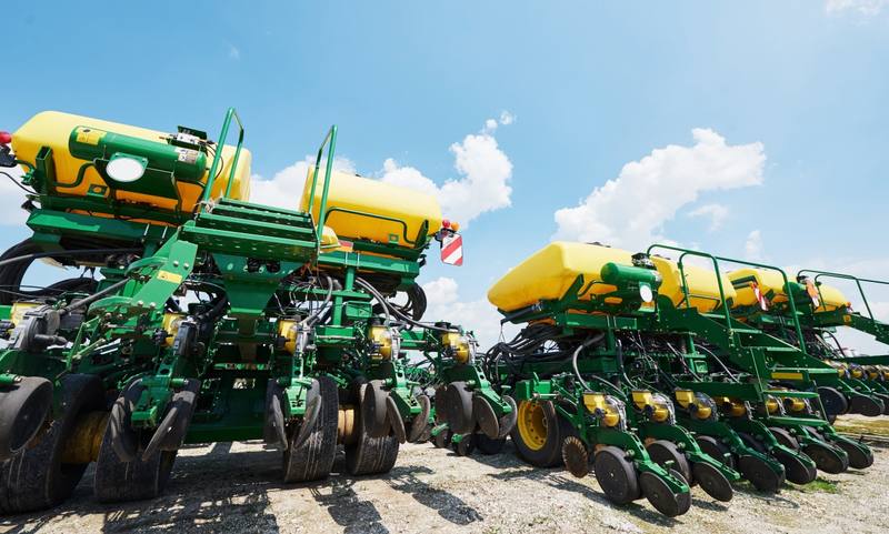close-up-seeder-attached-tractor-field