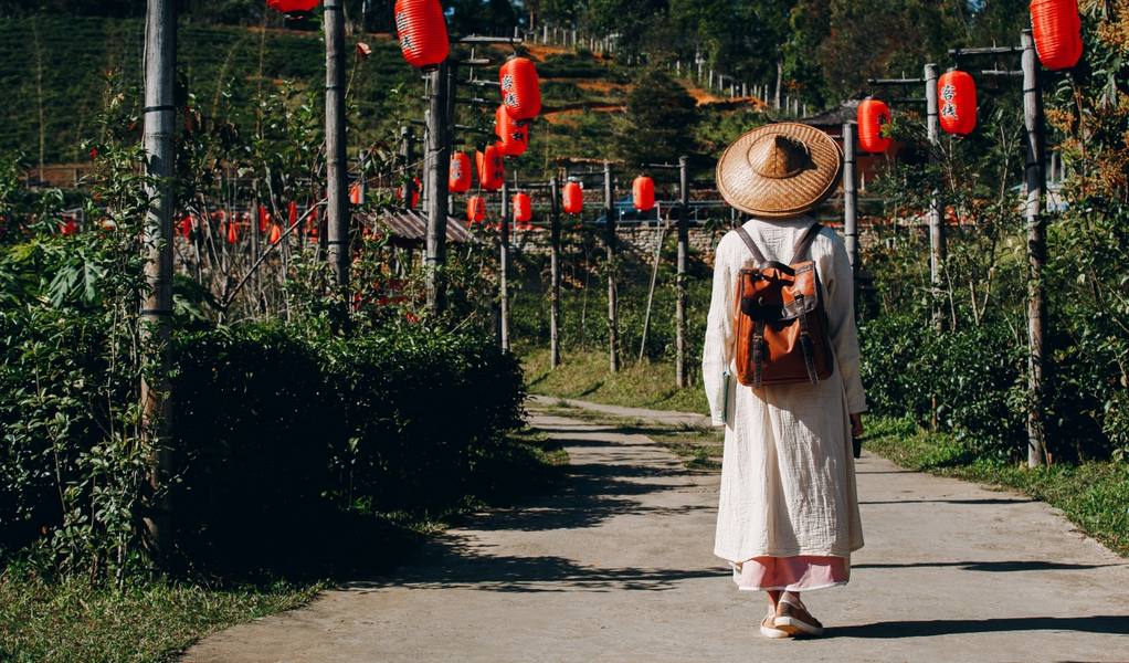 female-tourists-spread-their-arms-held-their-wings