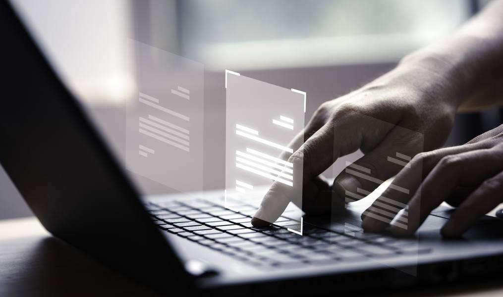 hand-using-laptop-computer-with-virtual-screen-document-online-approve-paperless-quality-assurance-erp-management-concept