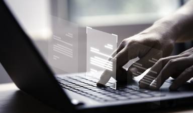 hand-using-laptop-computer-with-virtual-screen-document-online-approve-paperless-quality-assurance-erp-management-concept