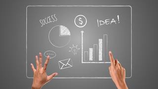 hands-pointing-successful-graphs-written-with-white-chalk-draw-concept