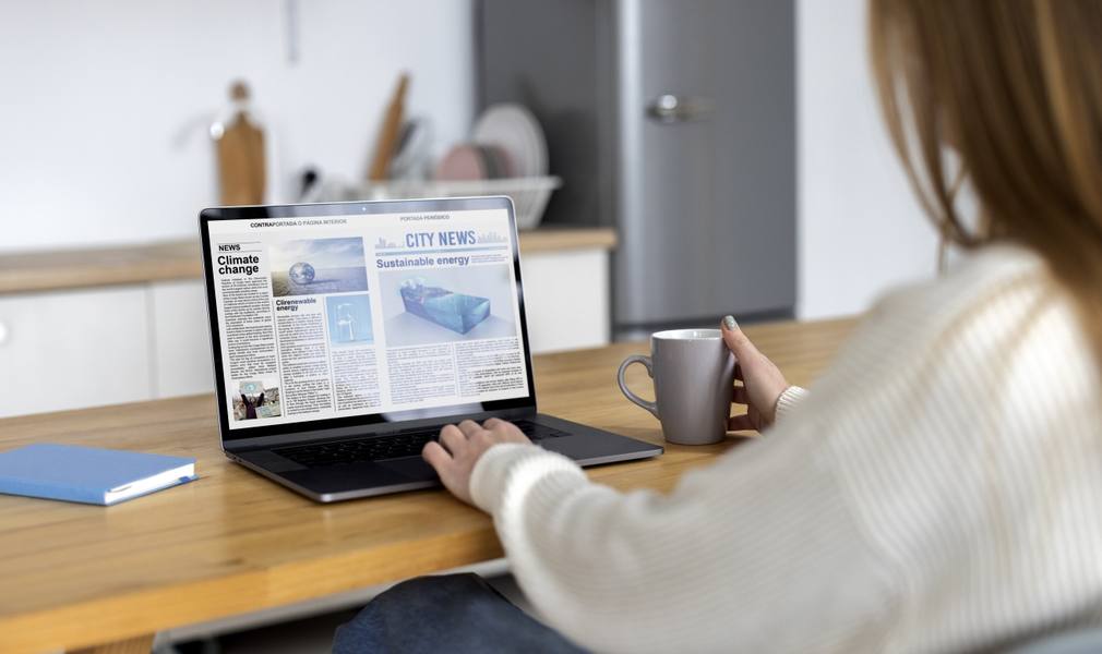 side-view-woman-reading-digital-magazine
