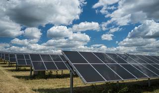 solar-panels-used-renewable-energy-field-sky-full-clouds