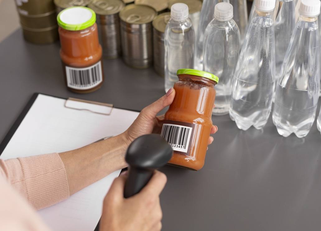volunteer-scanning-food-donations-charity