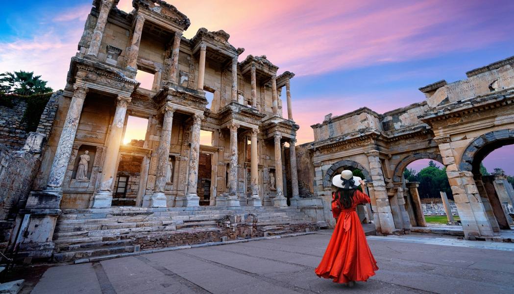 woman-standing-celsus-library-ephesus-ancient-city-izmir-turkey