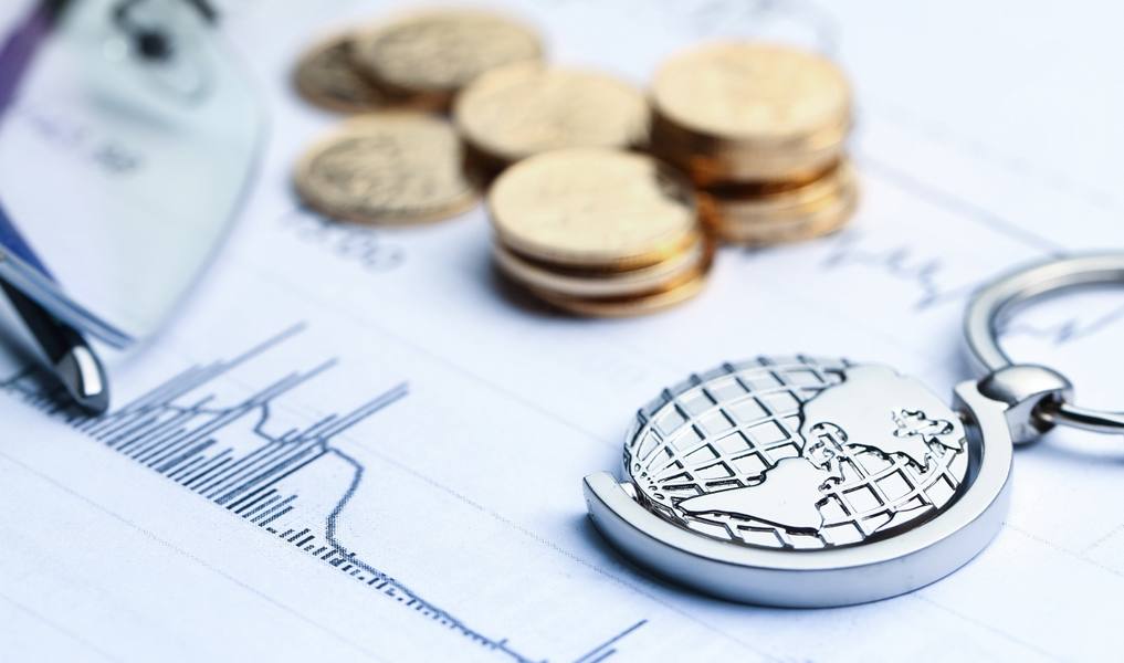 wp-5af023c8e54caaca-coins-paper-money-globe-white-statistic-form-background