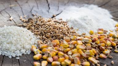 wp-5dbaba041181f8b8-grains-food-mix-wooden-background