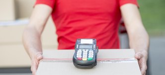 wp-619793670407c7b8-close-up-guy-holding-box-pos-machine