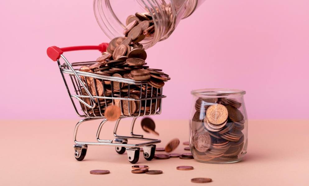 wp-651a62d431f37731-front-view-shopping-cart-with-lots-coins-jar