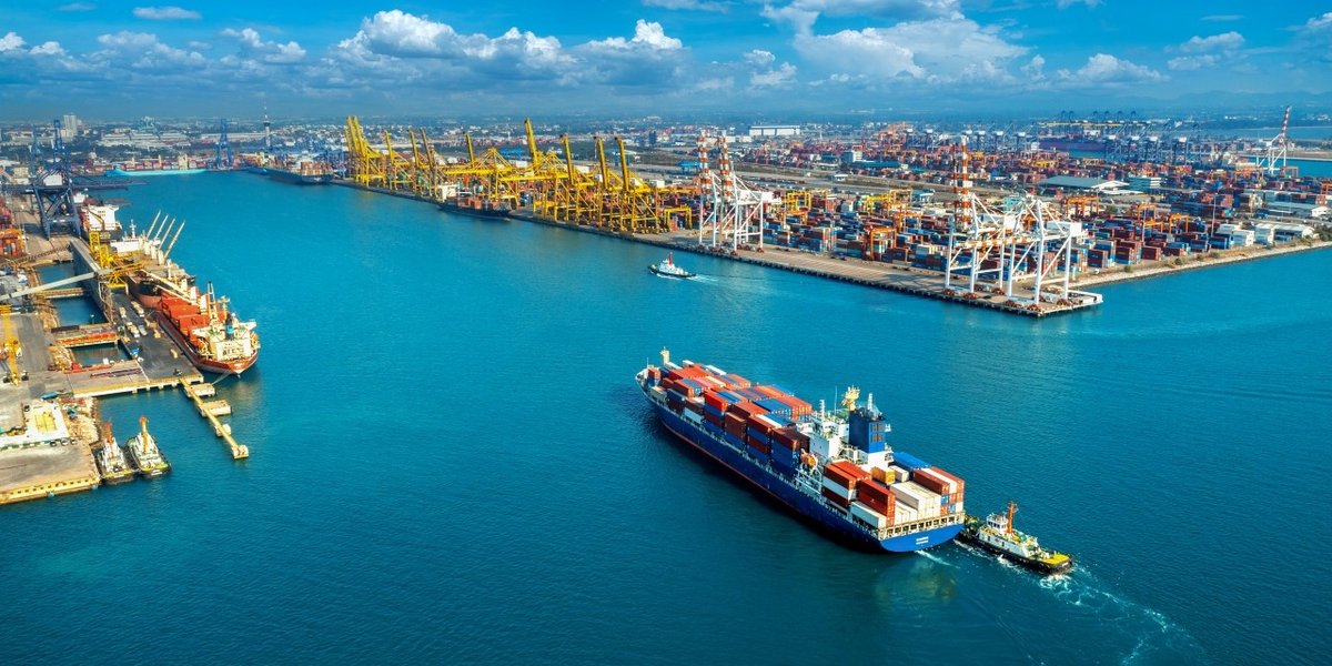 wp-7e18a10672e0ad7d-aerial-view-cargo-ship-cargo-container-harbor