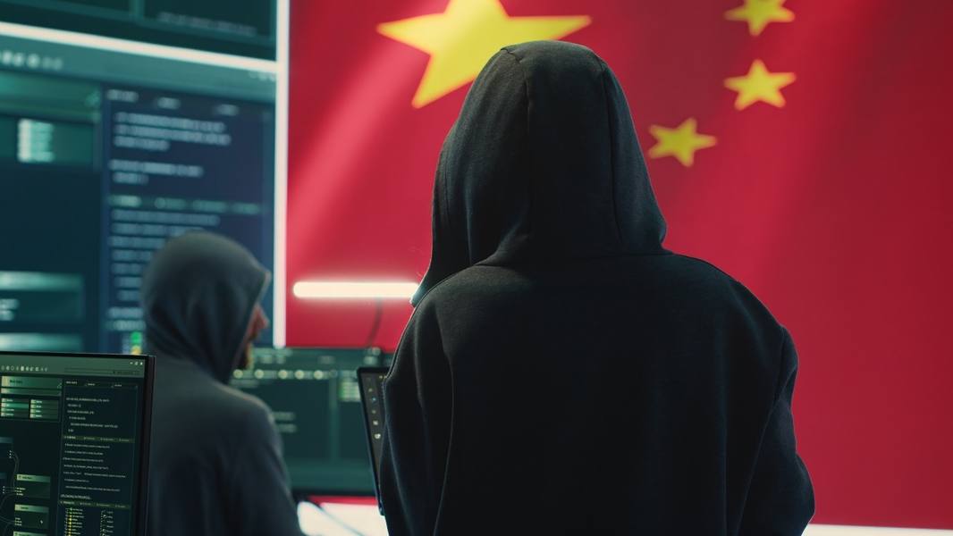 wp-85359bf607f506ba-chinese-hacker-working-governmental-hacking-room-with-chinese-flag