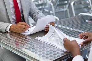 wp-920fbc6ce491e326-business-partners-checking-signing-document