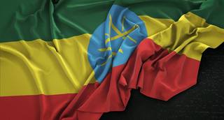 wp-ac6d122db05cbe18-ethiopia-flag-wrinkled-dark-background-3d-render