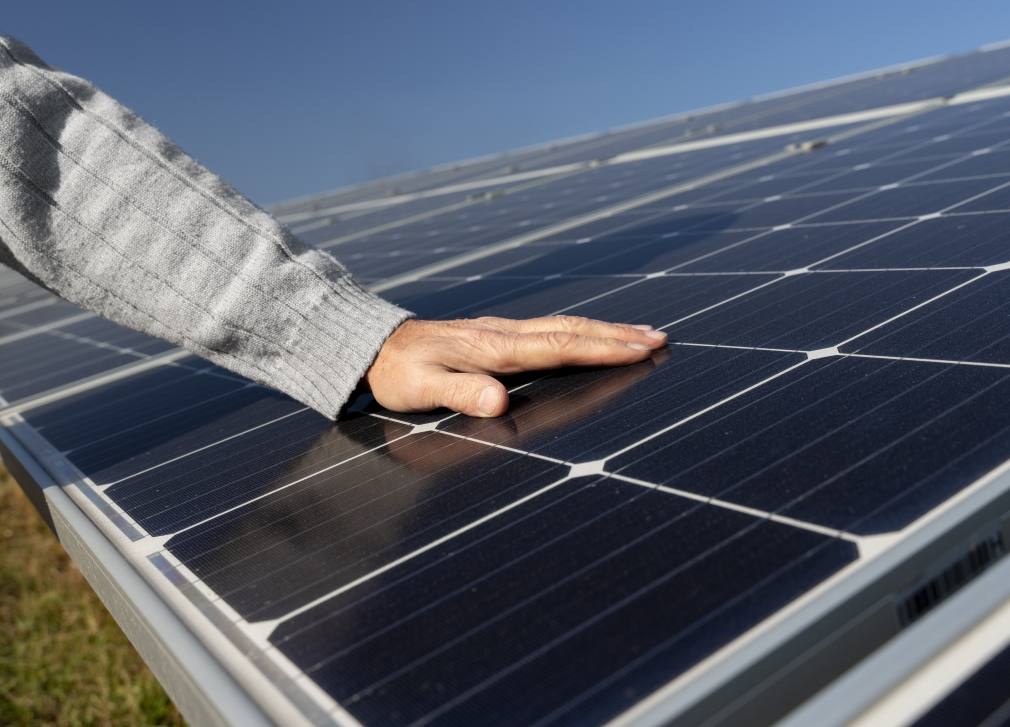 wp-b47759fa04d66c09-person-near-alternative-energy-plant