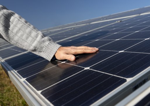 wp-b47759fa04d66c09-person-near-alternative-energy-plant