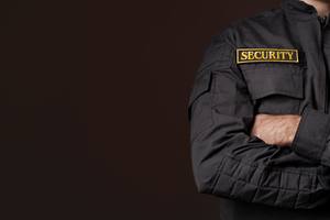 wp-d8ea64a61b7c0e5e-portrait-male-security-guard-with-uniform