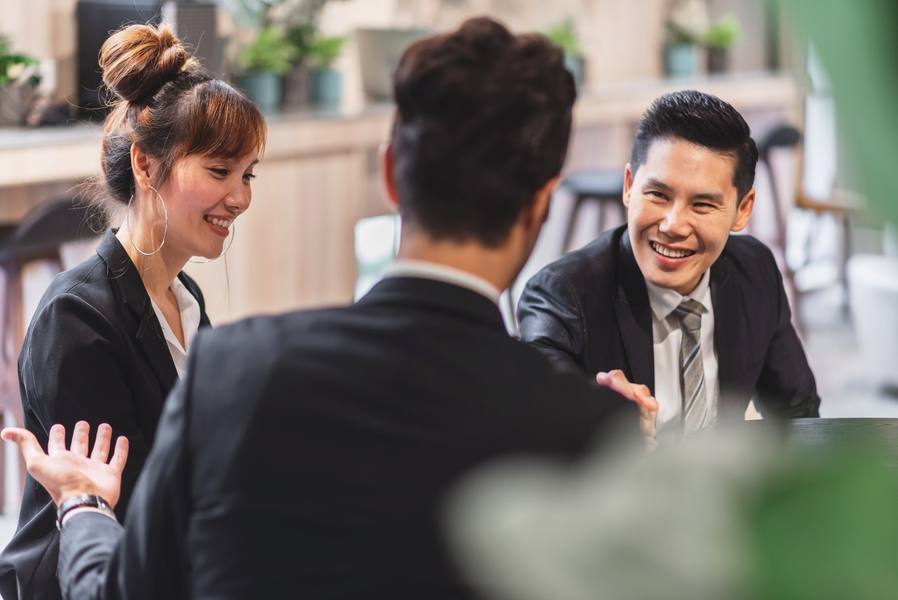 wp-e19b527ca8d5f6d3-group-diverse-business-people-successful-teamwork-working-together-with-laptop-c