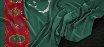 wp-e376c78947ecd68c-turkmenistan-flag-wrinkled-dark-background-3d-render
