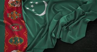 wp-e376c78947ecd68c-turkmenistan-flag-wrinkled-dark-background-3d-render