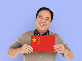 wp-ec9d2710e3140329-man-hands-hold-china-flag-patriotism